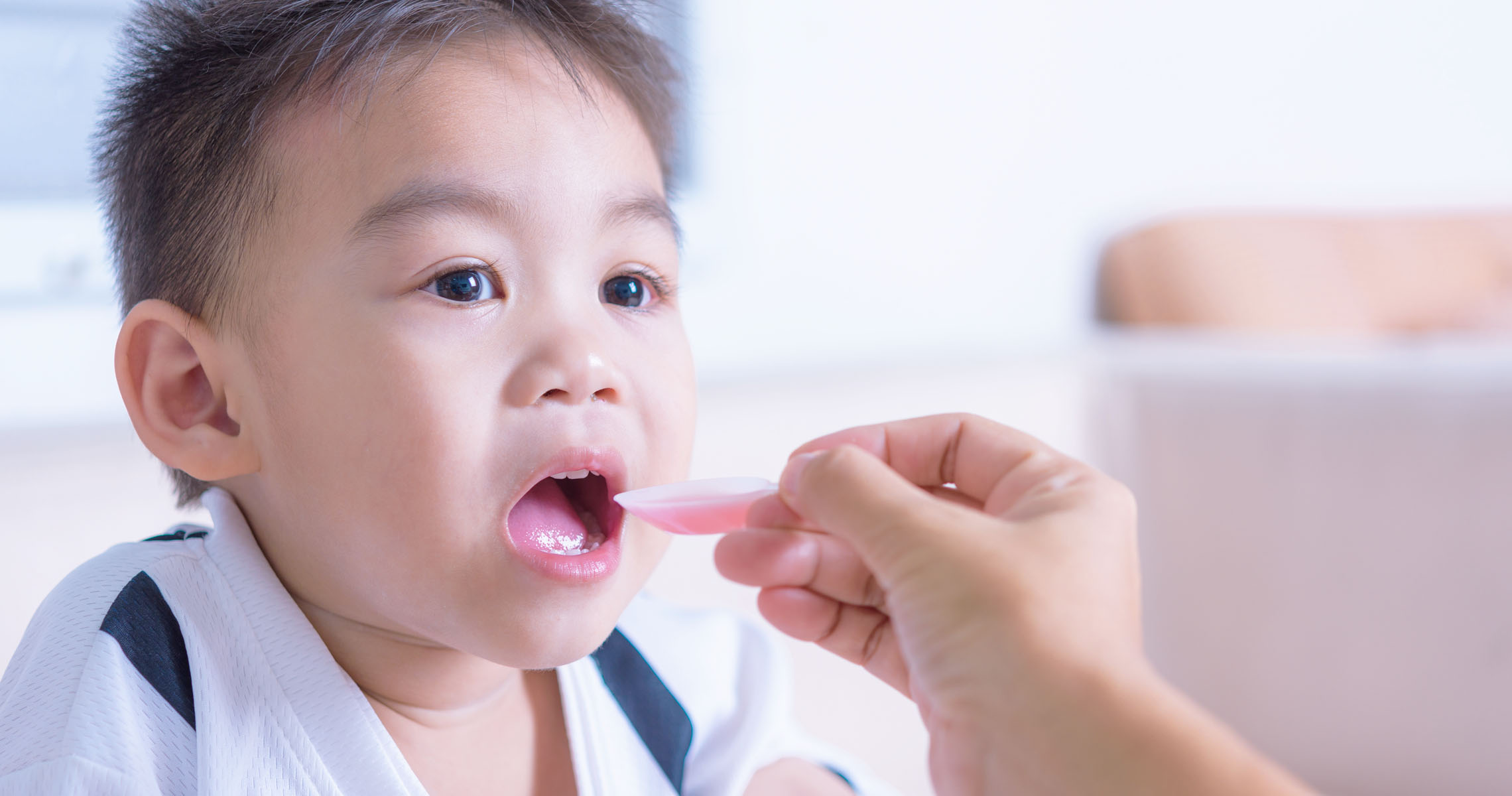 child taking medication